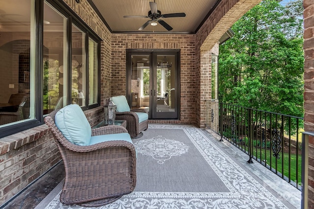 view of patio with french doors and ceiling fan