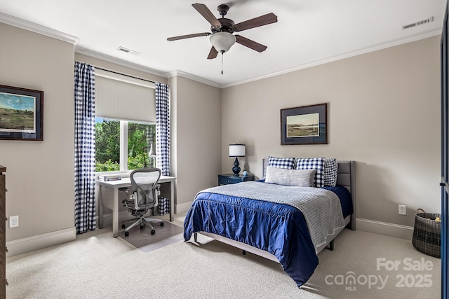 carpeted bedroom featuring crown molding and ceiling fan