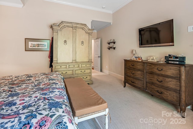 carpeted bedroom featuring crown molding