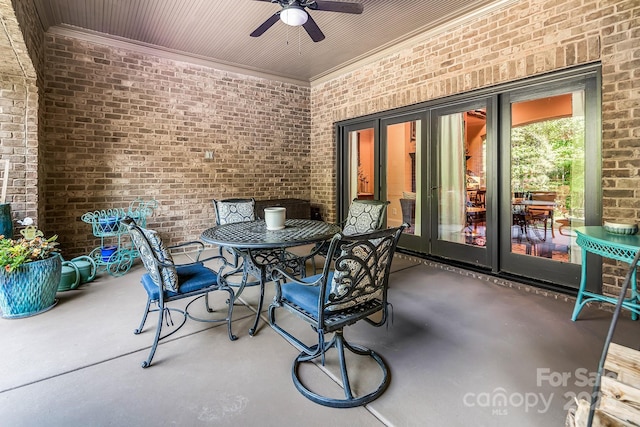 view of patio featuring ceiling fan