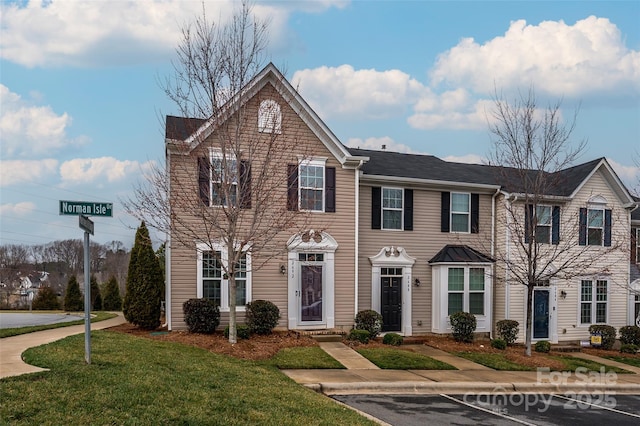 view of front of house with a front lawn