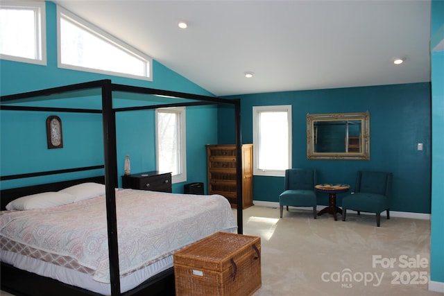 carpeted bedroom featuring recessed lighting, multiple windows, vaulted ceiling, and baseboards