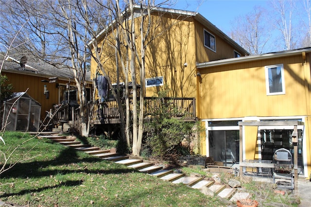 back of house with stairway