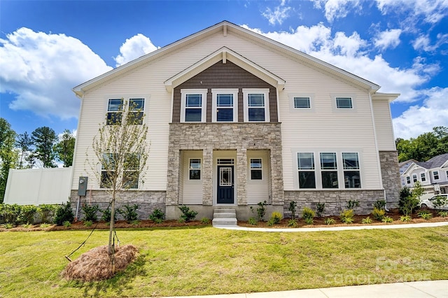 view of front of home with a front lawn