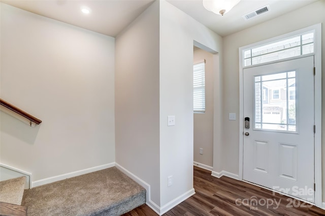 entrance foyer featuring dark hardwood / wood-style flooring