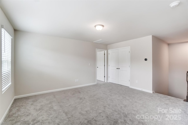 empty room featuring carpet floors