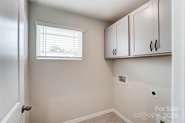 laundry area with cabinets, washer hookup, and hookup for an electric dryer