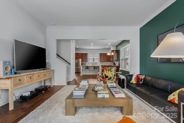 living room featuring crown molding and dark hardwood / wood-style flooring