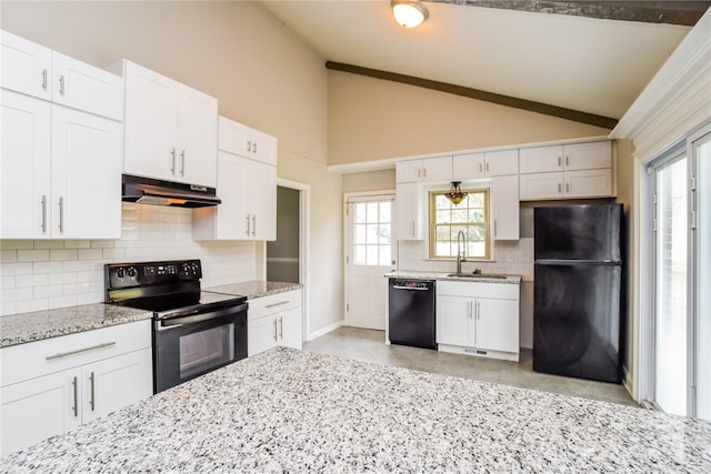 kitchen with lofted ceiling, sink, white cabinetry, tasteful backsplash, and black appliances