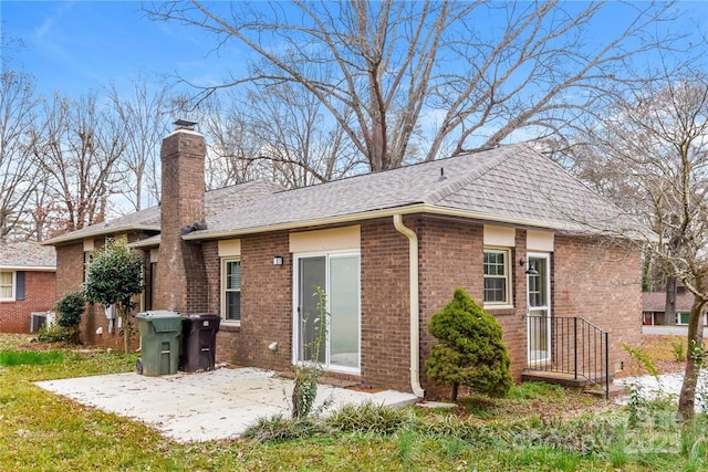 back of house featuring a patio area