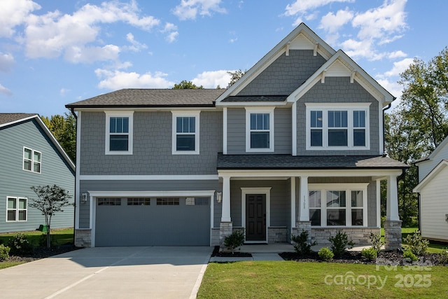 craftsman-style home with a porch, a garage, and a front lawn