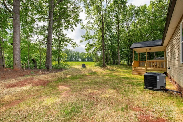 view of yard with central AC unit