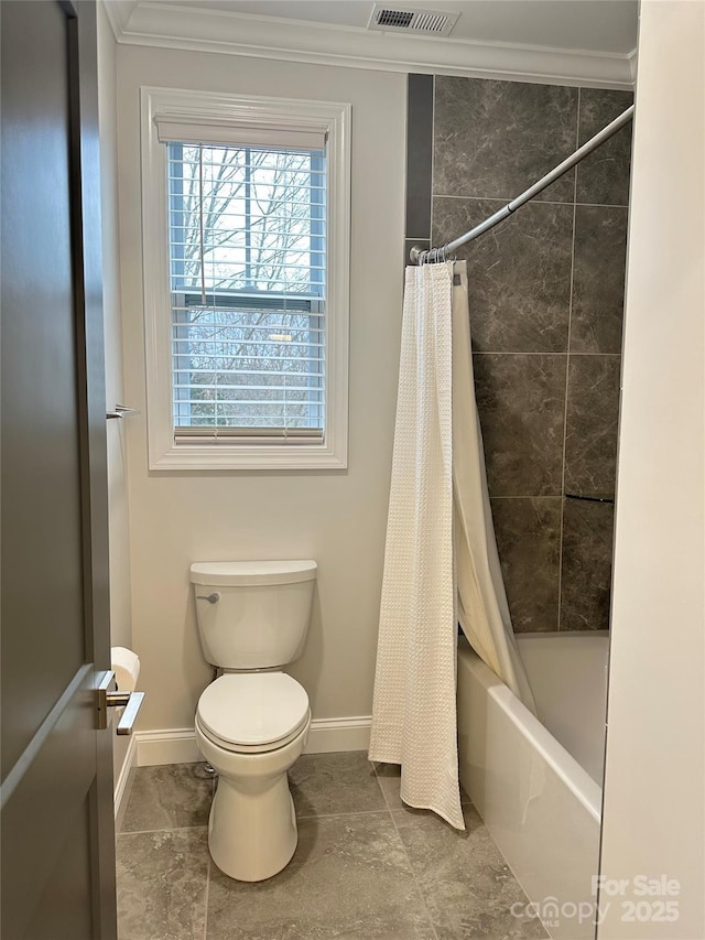 bathroom with shower / tub combo, ornamental molding, and toilet