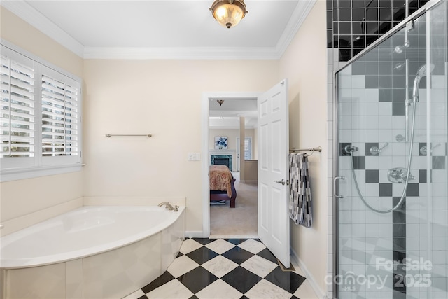 bathroom with ornamental molding, a stall shower, a garden tub, and ensuite bathroom