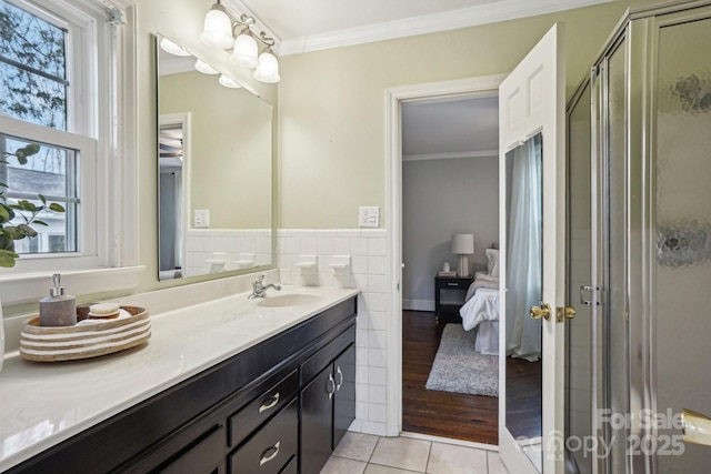 full bath with a shower stall, tile patterned floors, ensuite bath, and crown molding