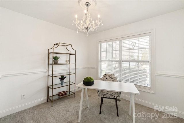 carpeted office featuring a chandelier and baseboards