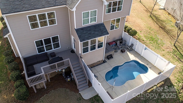 back of house with a patio