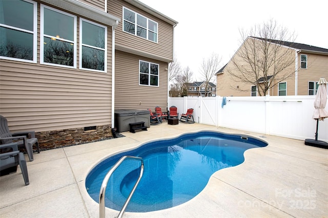 view of swimming pool featuring a patio