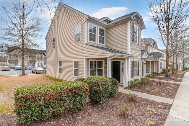 view of front of home with a residential view