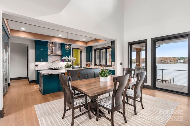 180 Willow Point Rd, Troutman, NC 28166 - dining space featuring light wood-type flooring and recessed lighting