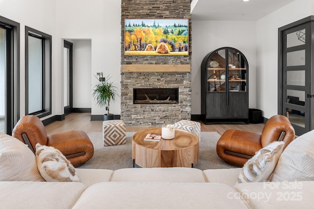 180 Willow Point Rd, Troutman, NC 28166 - living room with wood finished floors and a fireplace