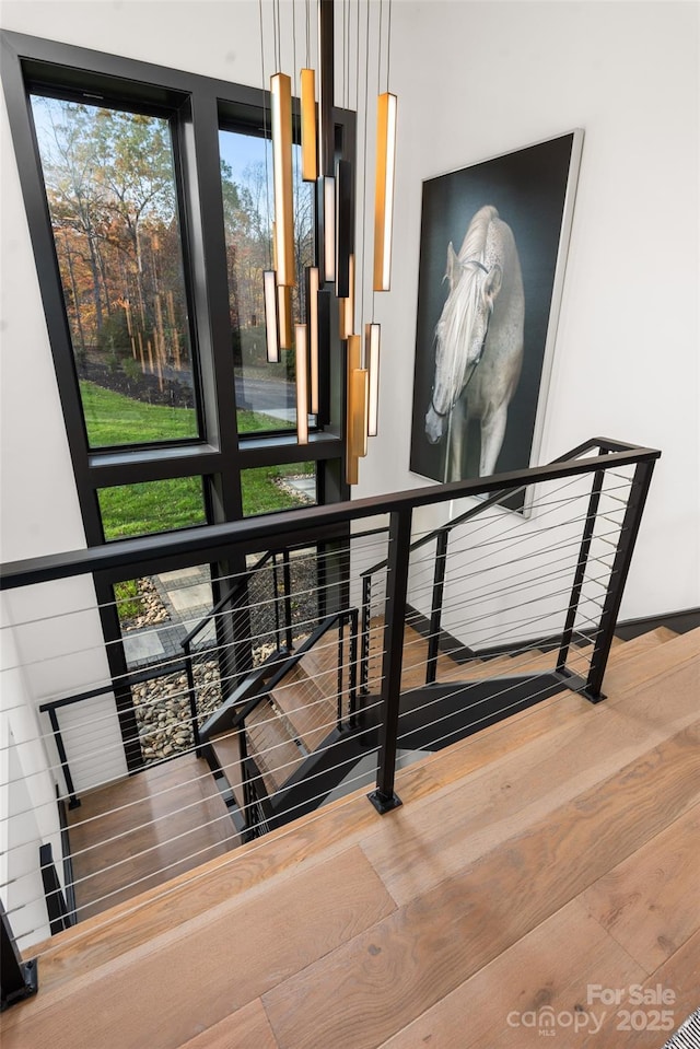 180 Willow Point Rd, Troutman, NC 28166 - staircase featuring wood finished floors