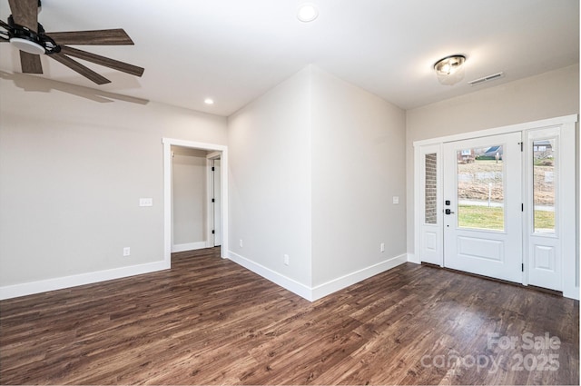 foyer with dark wood-type flooring and ceiling fan