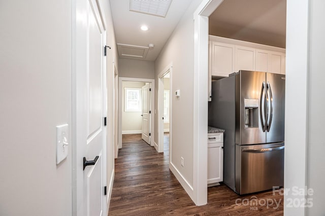 corridor featuring dark hardwood / wood-style flooring