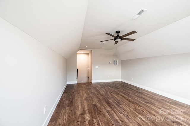 additional living space featuring vaulted ceiling, hardwood / wood-style floors, and ceiling fan