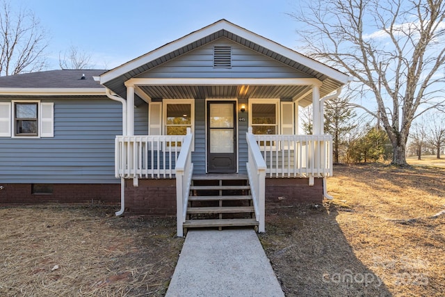 bungalow-style home featuring covered porch