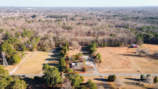 birds eye view of property featuring a rural view