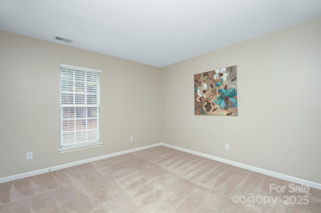 view of carpeted spare room