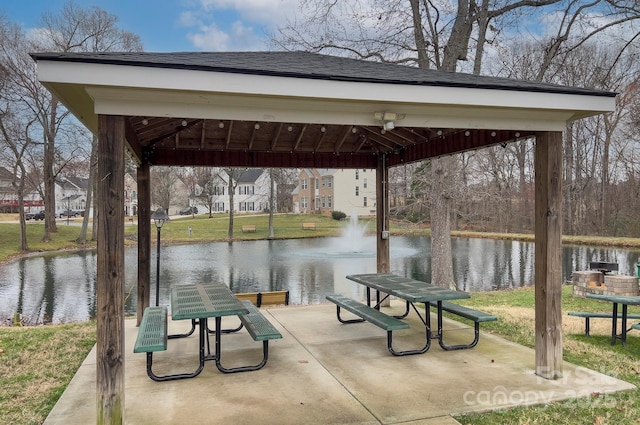 view of home's community featuring a gazebo and a water view