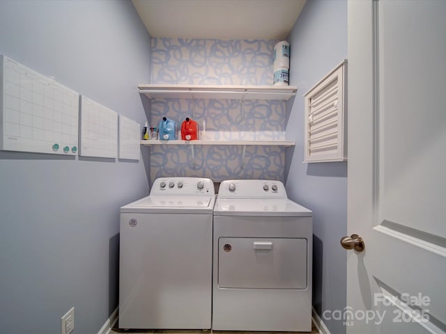 laundry area featuring washing machine and dryer