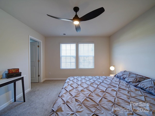 bedroom featuring light carpet and ceiling fan