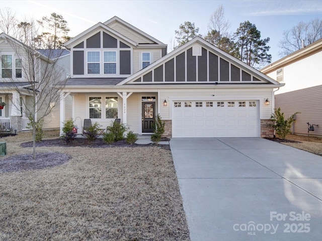 view of front of house with a garage and covered porch