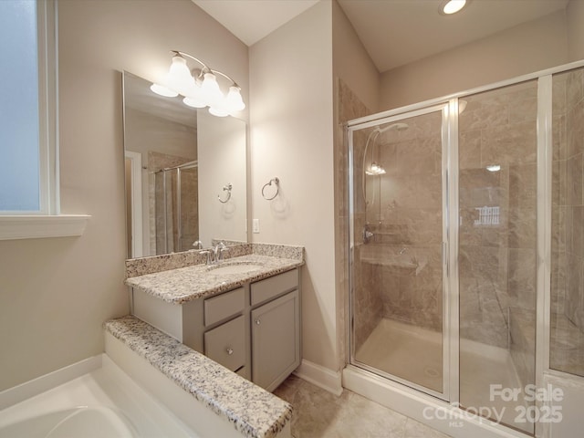 bathroom with vanity and an enclosed shower