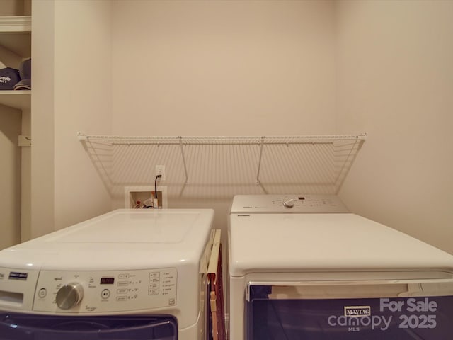 laundry area featuring washer and clothes dryer