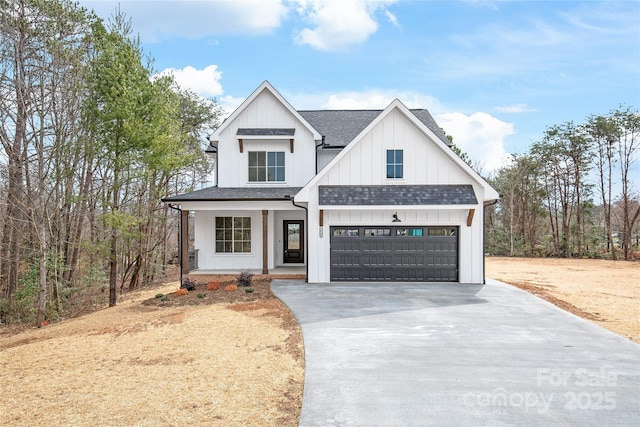 modern farmhouse with concrete driveway, a porch, board and batten siding, and roof with shingles