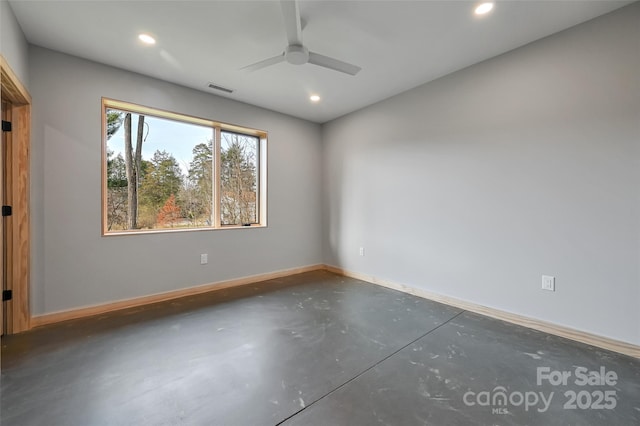 unfurnished room with ceiling fan