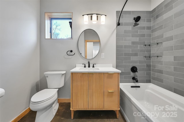 full bathroom with vanity, toilet, and tiled shower / bath combo