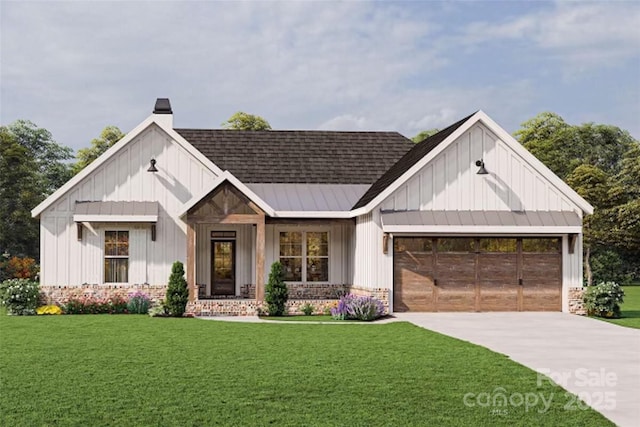 view of front of home with a garage and a front yard