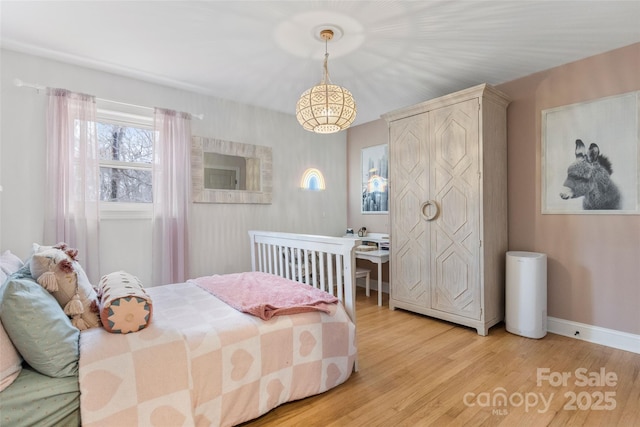 bedroom featuring light hardwood / wood-style floors