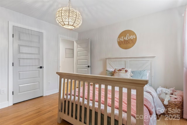 bedroom featuring hardwood / wood-style flooring