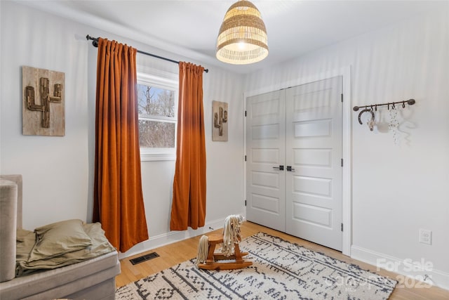 foyer with hardwood / wood-style floors