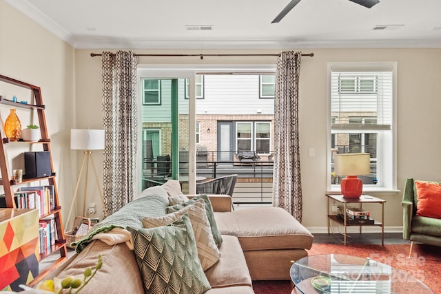 interior space featuring crown molding, ceiling fan, and hardwood / wood-style flooring