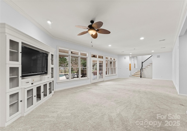 unfurnished living room featuring stairway, recessed lighting, a ceiling fan, and ornamental molding