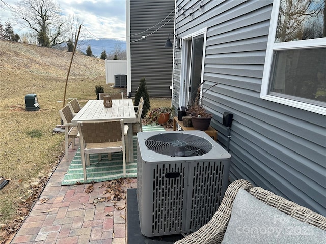 view of patio featuring central air condition unit