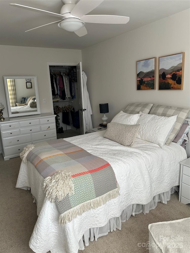 bedroom with carpet flooring, ceiling fan, and a closet