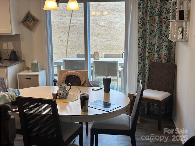 dining room featuring hardwood / wood-style floors